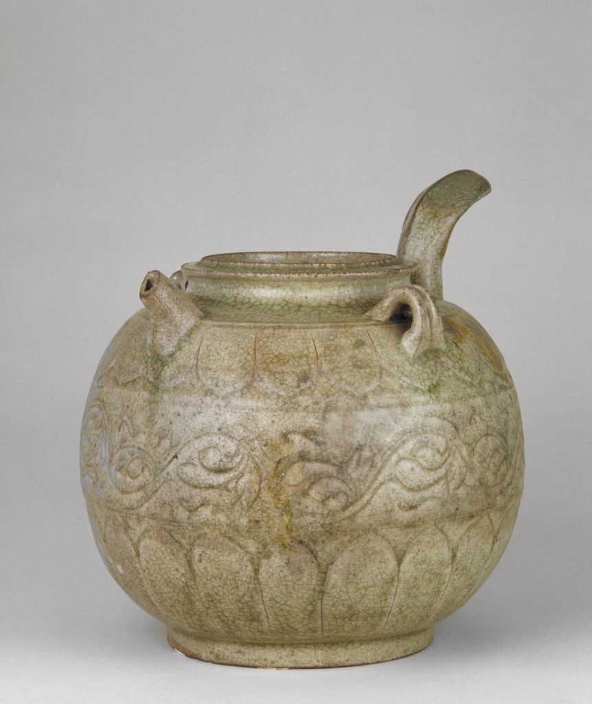 图片[1]-Single-handled pot with blue glaze and honeysuckle pattern-China Archive